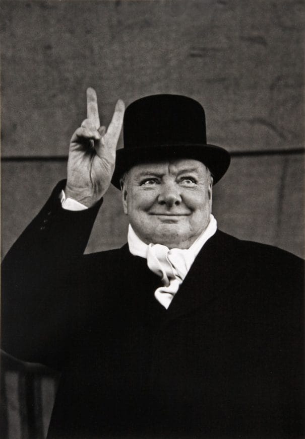 Alfred Eisenstaedt: Winston Churchill gives the victory sign at a political rally, Liverpool, 1951